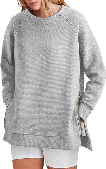 Felpa oversize a costine con zip laterali